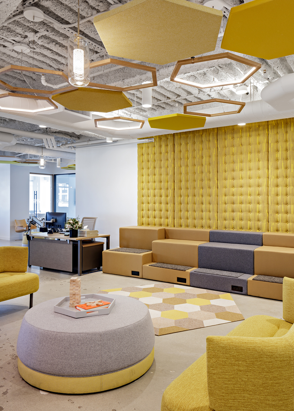 Close view of Duo lighting integrated into the Honeycomb office design
