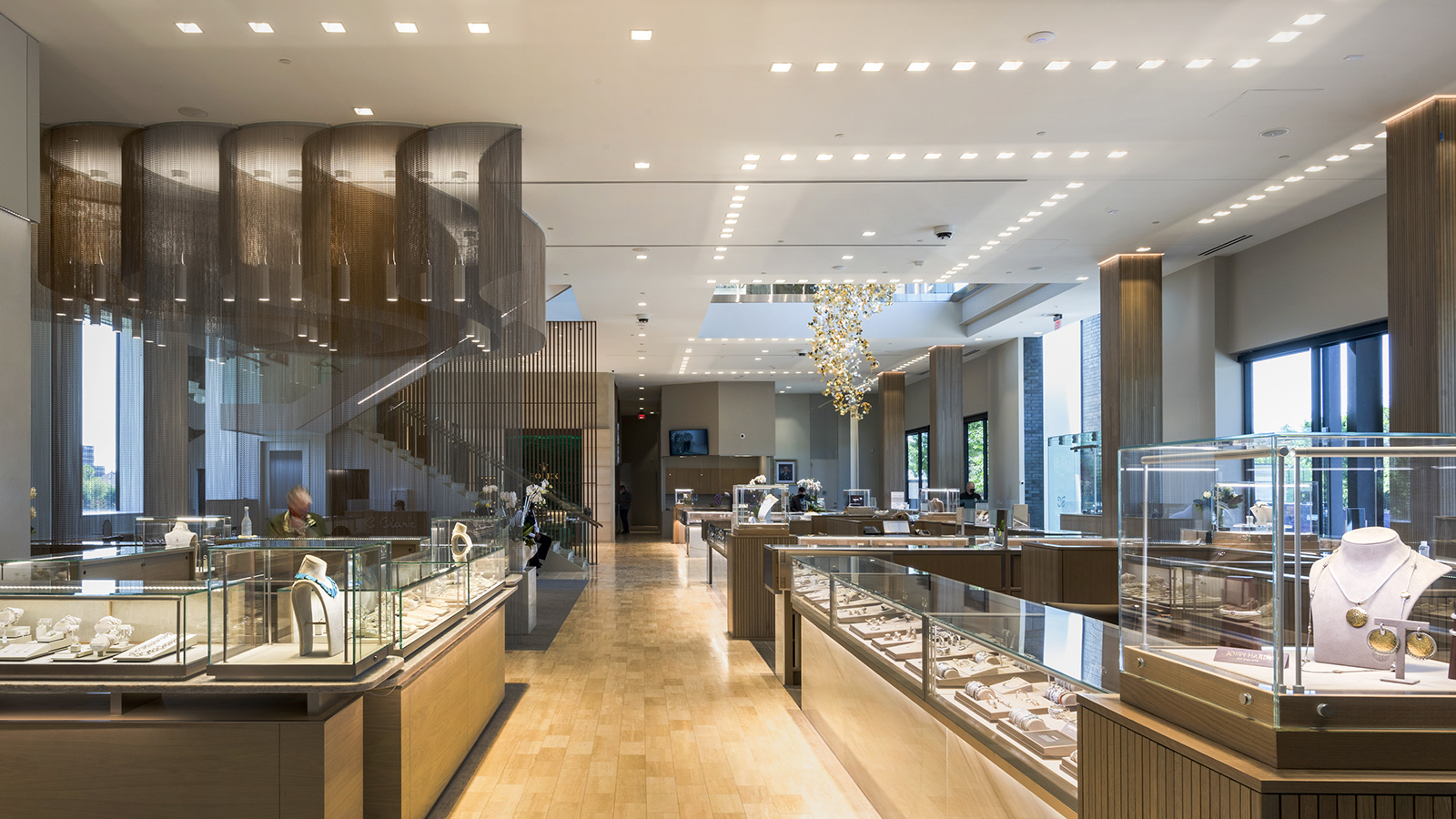 Wide interior view of BC Clark Jewelers with bi-directional pendant lighting