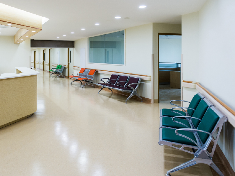 Healthcare facility corridor with seating